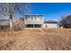 View of the backyard and the house at 15716 E Temple Pl, Aurora, CO 80015