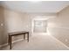 View of finished basement with neutral walls, carpet, and table at 15716 E Temple Pl, Aurora, CO 80015