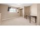 Bright bedroom featuring a window, closet, and table at 15716 E Temple Pl, Aurora, CO 80015