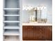 Double vanity bathroom with large mirror, plenty of storage, and a soaking tub at 150 S Madison St # 112, Denver, CO 80209