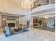 Luxurious lobby with fireplace, elegant furnishings, and convenient elevator access at 1827 N Grant St # 604, Denver, CO 80203