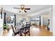 Cozy living and dining area with a dining table set and comfortable living space at 3663 S Sheridan Blvd # P1, Denver, CO 80235