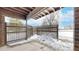 Covered patio enclosed by a fence, perfect for privacy and outdoor enjoyment at 3663 S Sheridan Blvd # P1, Denver, CO 80235
