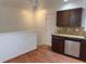 Cozy kitchen with stainless steel appliances and wooden floors at 16753 E Ithaca Pl, Aurora, CO 80013
