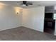 Cozy living room with new carpet and paint, and lots of space at 16753 E Ithaca Pl, Aurora, CO 80013