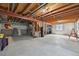 Spacious unfinished basement with exposed beams and ductwork, perfect for customization at 6468 S Forest St, Centennial, CO 80121