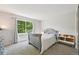 Cozy bedroom with ample natural light and a comfortable space perfect for a baby or  at 6468 S Forest St, Centennial, CO 80121