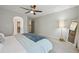 Spacious primary bedroom with an attached ensuite bathroom and walk-in closet, offering convenience and privacy at 6468 S Forest St, Centennial, CO 80121