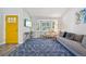 Bright living room with hardwood floors, bay window, comfortable seating, and stylish decor at 6468 S Forest St, Centennial, CO 80121