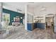 Open-concept living space with kitchen, living room, and dining area at 6468 S Forest St, Centennial, CO 80121