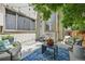Outdoor patio with seating and a blue patterned rug at 6468 S Forest St, Centennial, CO 80121