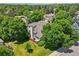 Aerial view of home surrounded by mature trees and lush landscaping offering privacy at 6468 S Forest St, Centennial, CO 80121
