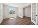 Well-lit office space boasting elegant French doors and stylish wood floors throughout at 5583 Riverbend Ave, Firestone, CO 80504