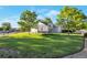 Spacious backyard with green lawn, perfect for outdoor activities and recreation at 1801 Aspen St, Fort Lupton, CO 80621