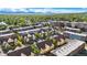 Wide aerial view of the community showcasing the neighborhood's layout and surrounding greenery at 5444 Zephyr St # 203, Arvada, CO 80002