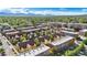 Panoramic aerial shot of the residential community with green landscape and mountain views in the distance at 5444 Zephyr St # 203, Arvada, CO 80002