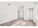 Bright, spacious bedroom with a double door closet and neutral carpet at 5444 Zephyr St # 203, Arvada, CO 80002
