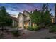 Charming two-story townhome with lush landscaping and inviting front entrance at 5444 Zephyr St # 203, Arvada, CO 80002