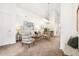 Inviting living room featuring neutral decor, stylish seating, and a welcoming atmosphere at 5444 Zephyr St # 203, Arvada, CO 80002