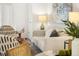 Comfortable living room with neutral tones, modern decor, and lots of natural light at 5444 Zephyr St # 203, Arvada, CO 80002