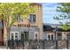 The Arvada Tavern featuring a brick facade, glass block windows and string lights at 5444 Zephyr St # 203, Arvada, CO 80002