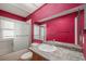 Well-lit bathroom with decorative shower doors, vanity, and modern fixtures at 7834 S Windermere Cir, Littleton, CO 80120