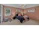 Serene bedroom with soft lighting, plush bedding, and calming color scheme at 2920 S York St, Denver, CO 80210