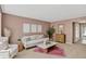 Elegant living room featuring stylish decor, plush seating, and a decorative mirror at 2920 S York St, Denver, CO 80210