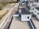 An aerial view showcases the rooftop deck of a home, offering a unique perspective of the outdoor living space at 888 S Valentia St # 101, Denver, CO 80247