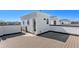 Enjoy outdoor living on this rooftop deck, offering a private escape with a small building for storage or relaxation at 888 S Valentia St # 101, Denver, CO 80247