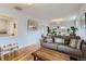 Cozy living room featuring hardwood floors, ample natural light, and neutral decor at 1335 S Sherman St, Denver, CO 80210