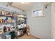 Basement storage room with shelving offers ample space for pantry items and household supplies at 1335 S Sherman St, Denver, CO 80210