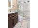 Modern bathroom featuring large shower with glass door and a new sink at 140 Lane Ct, Fort Lupton, CO 80621