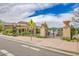 Community pool area with a pergola and decorative iron gates, creating an inviting atmosphere at 9218 Viaggio Way, Highlands Ranch, CO 80126