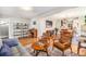 Inviting living room offering open views of the dining area and bright natural light at 4440 W Hayward Pl, Denver, CO 80212