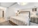 Relaxing bedroom with neutral tones, cozy carpet, and ample natural light, creating a peaceful retreat at 4440 W Hayward Pl, Denver, CO 80212