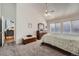 Comfortable bedroom featuring plush carpeting, a dresser, and large windows at 2275 S Kenton St, Aurora, CO 80014