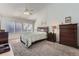 Spacious bedroom with neutral carpet, vaulted ceilings, and ample natural light at 2275 S Kenton St, Aurora, CO 80014