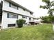 Exterior of home with a well-maintained lawn and deck, great for outdoor enjoyment at 3262 S Salida Way, Aurora, CO 80013