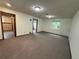 Finished basement area with doorways, and window, providing a cozy and functional space at 3262 S Salida Way, Aurora, CO 80013