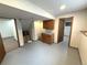 Basement featuring cabinets and doorways, offering versatile space for various uses at 3262 S Salida Way, Aurora, CO 80013