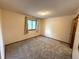 Empty bedroom with carpet and a window at 3262 S Salida Way, Aurora, CO 80013