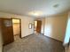 Spacious bedroom with neutral carpeting, closet, and doorway to the rest of the home at 3262 S Salida Way, Aurora, CO 80013