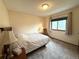 Bedroom with carpet, a lamp, and a bed at 3262 S Salida Way, Aurora, CO 80013