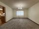 Formal dining room with neutral walls, carpet, and natural light at 3262 S Salida Way, Aurora, CO 80013