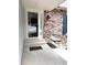 Inviting front porch features a brick wall and a bench to enjoy the outdoors at 3262 S Salida Way, Aurora, CO 80013
