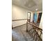 Hallway with railing overlooking the stairway at 3262 S Salida Way, Aurora, CO 80013