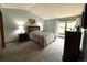 Well lit main bedroom with vaulted ceiling and a large window at 3262 S Salida Way, Aurora, CO 80013