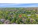 Located in a community with mature trees, this property is near a neighborhood pond at 5746 Aspen Creek Dr, Broomfield, CO 80020