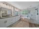 Modern bathroom with double vanity, soaking tub and glass shower at 5746 Aspen Creek Dr, Broomfield, CO 80020